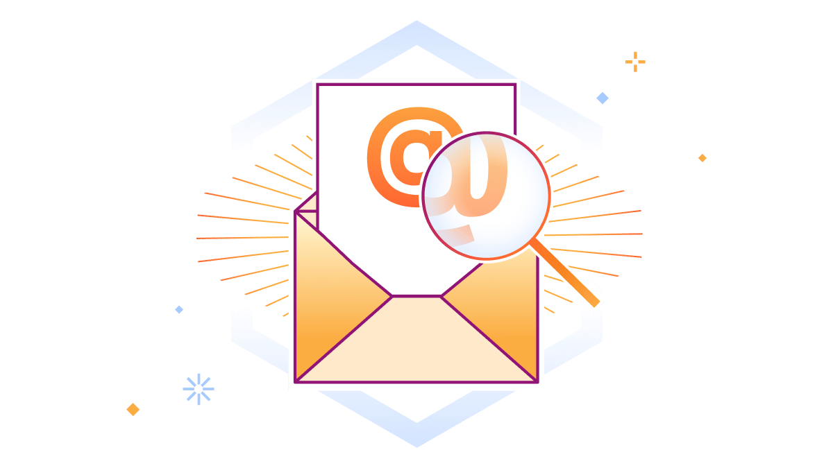 Email @ sign being enlarged by a magnifying glass
